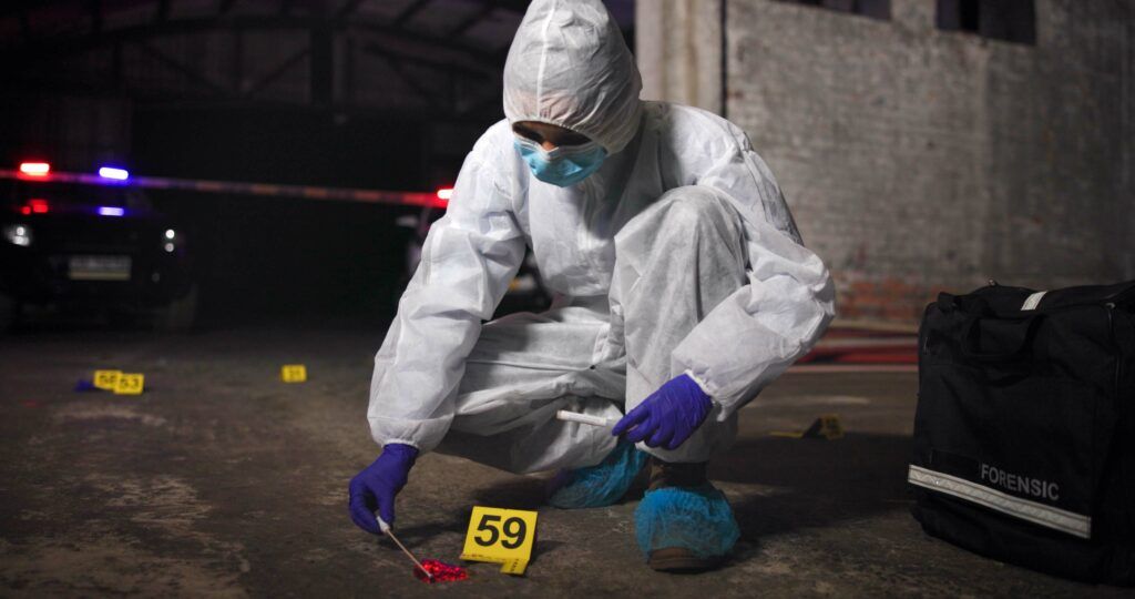 Forensic investigator collecting evidence at a crime scene, illustrating legal searches and privacy rights under Canadian law.